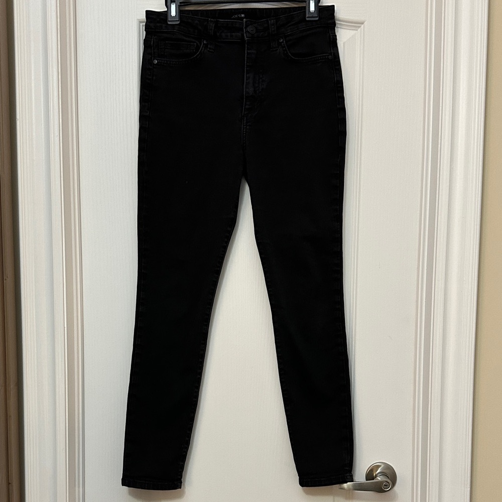 Joe's Jeans in a dark wash color.